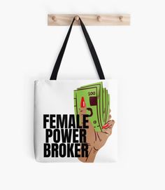 a tote bag with the words female power broke in black on it and a hand holding