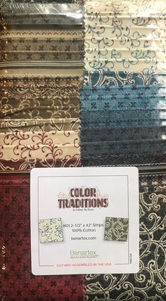 an assortment of fabrics for sale in a store