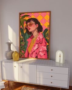 a painting on a wall above a dresser