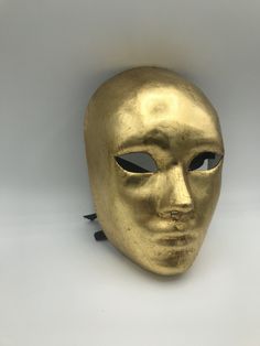 Venetian Mask Masquerade for Men or for Women - Traditional and original papier-mache Venetian mask, handmade and decorated with Gold leaf and silver leaf. All our masks are handmade papier-machè masks made in Venice in our Atelier Our decorators use techniques typical of the Venetian tradition such as stucco, acrylics and glitter. This Venice mask shape is available in different colors and it's considered as a very original one. We ship Worldwilde with DHL & FedEx. Only door-to-door shipmen Gold Skull Mask, Roman Mask, Bronze Mask, Mask Photoshoot, Gothic Mask, Iron Mask, Gold Face Mask, Venice Mask, Silver Mask