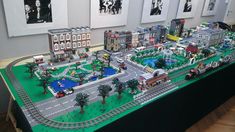 a lego model of a city is displayed on a table