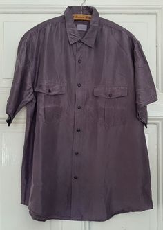 VINTAGE SHIRT : beautiful SHORT SLEEVE SHIRT... in good condition with breast pockets from the 1980s / 1990s made from 100% pure silk. Color : PURPLE PLEASE NOTE: The color of the shirt is identical in pictures 1 & 2. In the other pictures the color of the shirt was distorted by the camera due to the close-up and the lighting. PLEASE enlarge my pictures & zoom in so you can see the condition in more detail. Material: 100% silk Size : no information available. PLEASE CHECK therefore these specifi Summer Silk Shirt With Spread Collar, Silk Camp Collar Top For Summer, Summer Silk Top With Camp Collar, Silk Shirt With Button Closure For Summer, Collared Silk Blouse For Summer, Silk Collared Summer Blouse, Summer Silk Blouse With Collar, Silk Summer Shirt With Button Closure, Summer Silk Collared Blouse