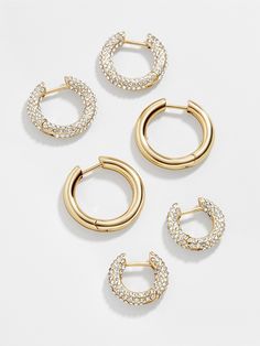 The Lucy Earring Set is sure to be your next everyday go-to. This set offers three styles: one all pave, another half pave and half gold, and finally one all-gold style. SHOP ALL VALUE SETS HERE 18k Gold Earrings, Crystal Hoop Earrings, Earrings In Gold, Dream Jewelry