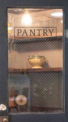 the pantry door is open to show what's inside