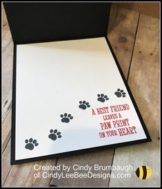 a card with paw prints on it and the words, a best friend is always a paw print on your heart