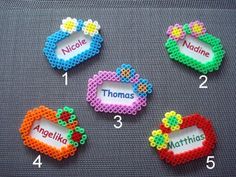 beaded name tags with different colors and designs on them, including one for each child's name