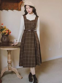 ❤︎High neck rib knit + check suspender skirt❤︎
This item will take 1 week to ship. Dress With Waist Belt, Plaid Overall Dress, Vintage Style Skirts, Overall Skirt, Academia Fashion, Midi Sundress, Wallpaper Photos, Cottagecore Dress, England Fashion