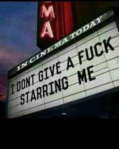 a movie marquee that says i don't give a f k starting me