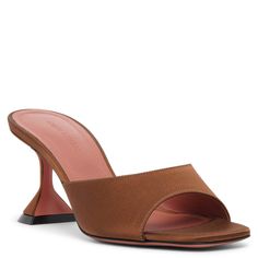 Brown satin mules from Amina Muaddi. The Lupita mules are made of brown satin with a square toe, leather lining and insole, featuring the designer’s signature "Martini" heel measuring 70mm.Leather soleTrue to sizeMade in Italy