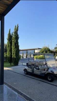 a golf cart parked in front of a building