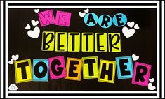 we are better together sign with hearts and paw prints on black background, framed in white frame