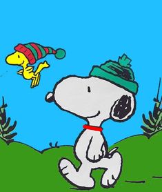 a drawing of a snoopy dog with a hat and scarf flying in the sky