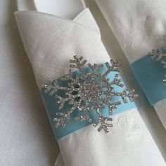 two napkins that have snowflakes on them