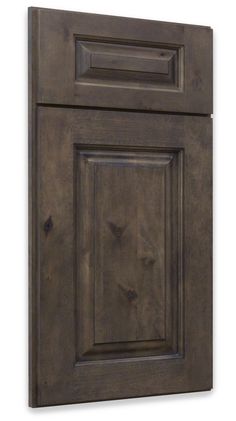 an image of a kitchen cabinet door in dark brown wood with no handles or knobs