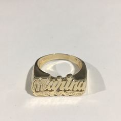 Beautiful 14k Yellow Gold Custom Made Marina Name Ring. Weight: 5.5g. Width: 10.5mm. New Without Tags. Size: 9.25. 14k White Gold Hallmarked Engraved Ring, Yellow Gold Sterling Silver Engraved Ring With Diamond Cut, Yellow Gold Sterling Silver Ring With Diamond Cut, Gold Name Ring, Personalized 14k Gold Fine Jewelry Rings, Personalized 14k Gold Rings Fine Jewelry, Gold Rings With Names, Personalized Yellow Gold Rings In Fine Jewelry Style, 14k Gold Nameplate Jewelry For Anniversary