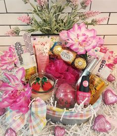 🌷Mother's Day Birthday Any Occasion Women Hamper Spa Gift Basket For Her Vanilla Sugar Spa Nail Polish Lipstick Cupcake Bath Bomb Candle Gift Box Gift Basket Includes: 1 Women's Floral Cosmetic Makeup Bag Pouch 1 April Bath & Shower Vanilla Sugar Scent Moisturizing Shampoo 2.5oz. 1 April Bath & Shower Vanilla Sugar Scent Moisturizing Conditioner 2.5oz. 1 Strawberry Scented Cupcake Bath Bomb Fizzer 2.5oz. 1 My Beauty Spot Vanilla Orchid Scented Hand Cream 1oz. 1 Luminessence Scented Vanilla Glass Jar Candle 3oz. 1 L.A. Colors Duo Lip Gloss & Lipstick 1 L.A. Colors Nail Polish Pink 2 Diamond Cosmetics Nail Filers  1 Bath Shower Sponge Pouf 3 Ferrero Rocher Hazelnut Pieces of Milk Chocolate 2 Strawberry Bon Bon Pieces of Candy 2 Spring Flower Decor 1 Metal Oval Tin Storage Basket This is a b Spring Flower Decor, Gift Basket For Her, Nail Polish Pink, Cherry Blossom Scent, Cherry Blossom Nails, Sugar Nails, Tin Storage, Shower Sponge, Gift Baskets For Women