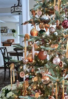 a decorated christmas tree with ornaments on it