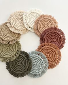 several circular pieces of woven material arranged in a circle on top of eachother