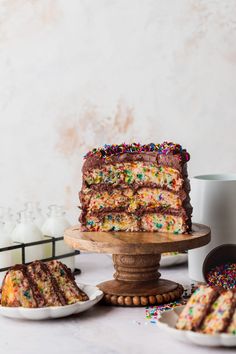 there is a cake on the table with sprinkles