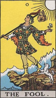 a tarot card with an image of a man holding a bird on top of a mountain