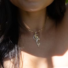 The Mahina (Moon) Mermaid captures moonlit nights in paradise. Inspired by Kananaka, a legendary mermaid who frequented the shores of Lāhainā in Maui singing and dancing under the light of the moon, this piece brings to life the magic and mystic of the Islands. "Mahina (Moon) Mermaid" Design Pendant 14k Yellow Gold Mermaid and 14k White Gold Moon 42mm Length x 19.5mm Width Natural Diamond: 0.273 CTW Chain not included, Shop Chains Now Exclusively Made in Hawaiʻi Forever Guarantee (Warranty on th Gold Mermaid, Mermaid Pendant, Hawaiian Jewelry, Gold Moon, Under The Lights, Gold Gold, Maui, Gold Pendant, Round Diamonds