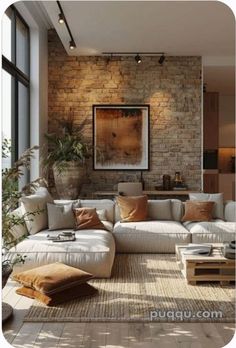 a living room filled with lots of furniture and decor on top of a wooden floor