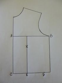 a drawing of a vest pattern on a white wall