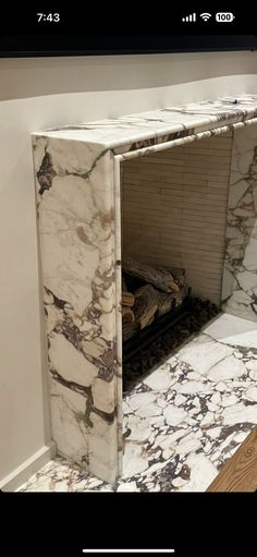 a room with marble walls and flooring in it