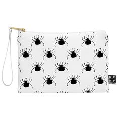 a white zipper bag with black spider print