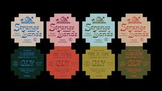 six different types of wine labels on a black background