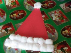 a santa hat made out of marshmallows sitting on top of a table