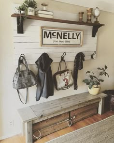 a wooden bench sitting under a sign that says men's only on it and some purses hanging from the wall