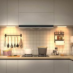 a stove top oven sitting inside of a kitchen next to a wall mounted range hood