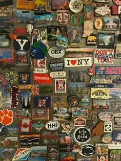 many different types and colors of stickers on a wall