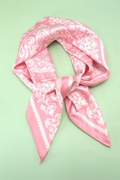 Paisley Pink Silky Feel Bandana Scarf, this beautiful scarf features a classic paisley pattern in a soft pink hue, crafted from a silky-feel fabric that drapes gracefully. Perfect for wearing around your neck, as a headband, or tied to your handbag, this versatile accessory effortlessly elevates any ensemble with its luxurious texture and timeless design. DIMENSIONLong 21.7"Width 21.7"Material: Polyester Pink Shawl Scarf, Pink Shawl Scarves For Spring, Pink Shawl Scarf For Spring, Pink Silk Shawl For Spring, Trendy Pink Silk Scarf, Elegant Pink Satin Scarves, Elegant Pink Satin Scarf, Trendy Pink Headscarf For Spring, Elegant Pink Bandana