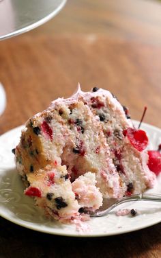 a piece of cake on a plate with a fork