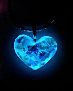 Small heart that glows in the Dark with blue iridescent flakes. Chain included is 18" Stainless steal in your choice of Silver or 18k Gold Plated. Luminous Jewelry For Valentine's Day Gift, Valentine's Day Luminous Jewelry Gift, Blue Luminous Jewelry For Gifts, Blue Luminous Jewelry For Party, Magical Luminous Blue Jewelry, Luminous Blue Jewelry For Parties, Glow In The Dark Necklace, Pink Purple Blue, Stainless Steal