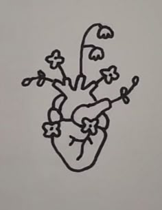 a drawing of a heart with flowers on it