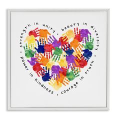 a heart made out of handprints with words written in different colors on it