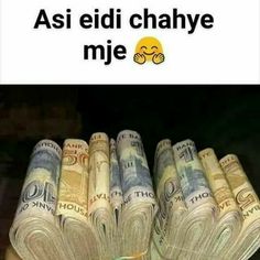 stacks of money sitting on top of each other in front of a sign that says, asi eidi chaye mie