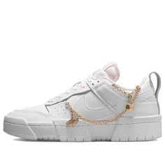 Nike Womens WMNS Dunk Low Disrupt White Metallic Gold DO5219-111 sneakmarks Wmns Dunk Low, Nike Dunk Low Disrupt, Vapour Max Nike, Nike Sacai, Gold Sneakers, Nike Gold, Womens Air Jordans, Gold Charms, Nike Sb Dunks