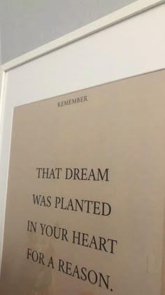 a sign on the wall that says, that dream was planted in your heart for a reason