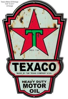 an old texaco sign is displayed on a white background with the words, heavy duty motor oil