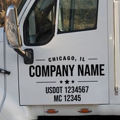 a white truck with chicago, illinois company name written on it's side window