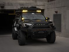 an armored vehicle parked in front of a building