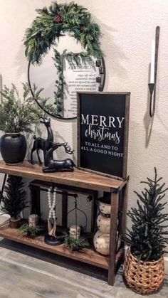 a shelf with christmas decorations on it and a merry sign in the corner next to it