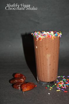 a chocolate shake with sprinkles and nuts