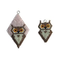 two pieces of beaded art with an owl face on it's side and one is