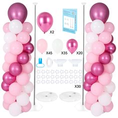 the balloon arch is decorated with pink and white balloons