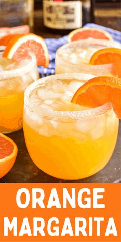 an orange margarita is garnished with grapefruit and served on a plate